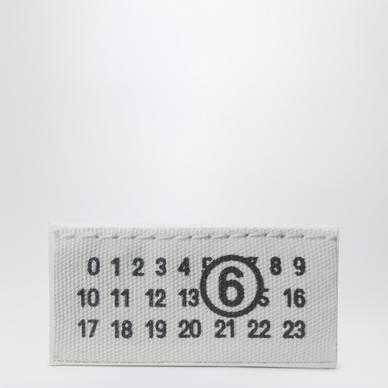 White fabric clutch numeric